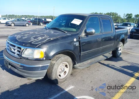 2001 Ford F150 Supercrew из США, поврежденный, VIN 1FTRW07L61KC53030